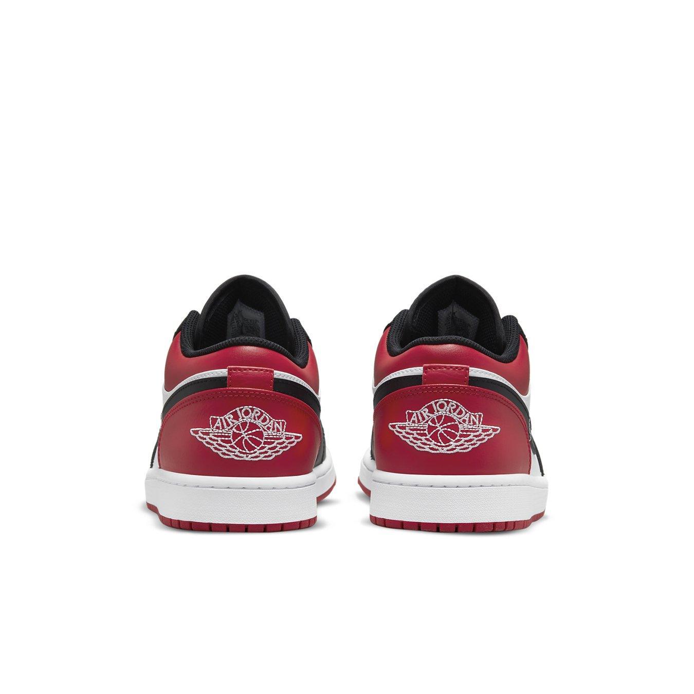 Retro Air Jordan 1 Low Bred Toe sneaker rear view showcasing red and black design with Wings logo.