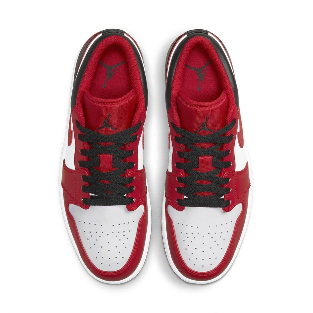 Top view of the Jordan 1 Low Bulls sneakers in red, black, and white leather with iconic Jordan branding.