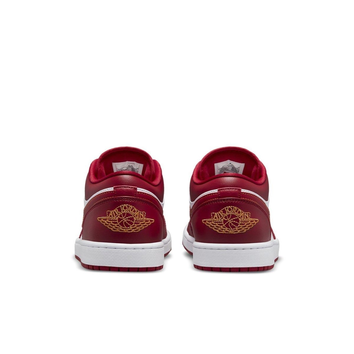 Retro Air Jordan 1 Low Cardinal Red sneaker rear view with iconic Wings logo and clean white sole.