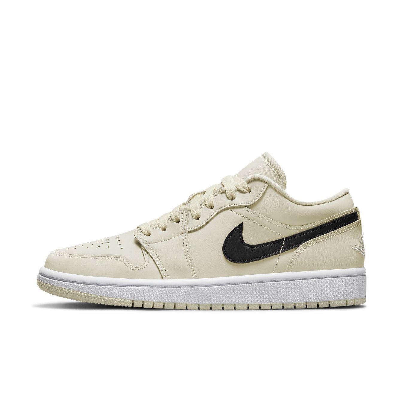 Air Jordan 1 Low Coconut Milk (W) in creamy white with black swoosh and logo, stylish sneaker for trendy looks.