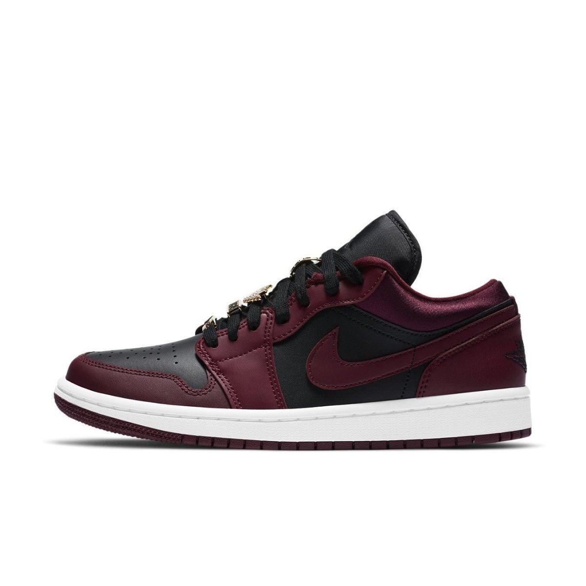 Jordan 1 Low Dark Beetroot Black women's sneakers featuring smooth leather, black toe, and striking beetroot accents.