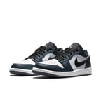 Air Jordan 1 Low Dark Teal sneakers in white leather with dark teal overlays and black Swoosh, laces, and lining.