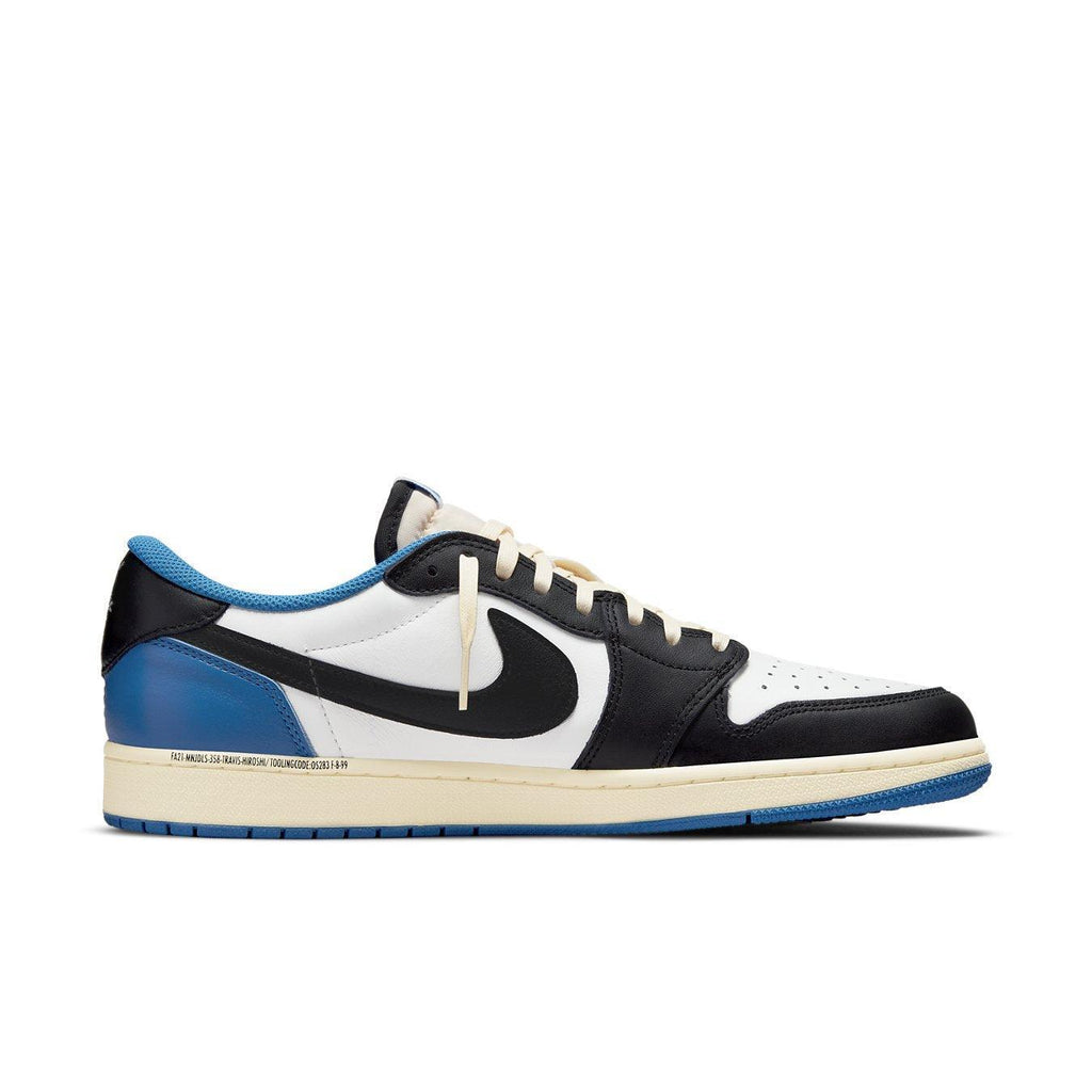 Jordan 1 Low Fragment Design x Travis Scott sneaker featuring white, black, and royal blue color scheme.