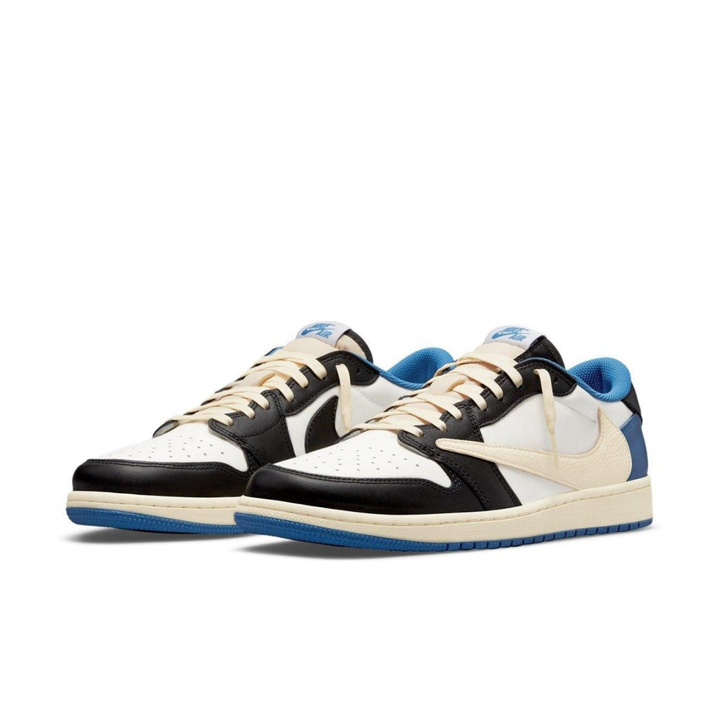Jordan 1 Low Fragment Design x Travis Scott in white, black, and royal blue colorway, showcasing sleek retro style.
