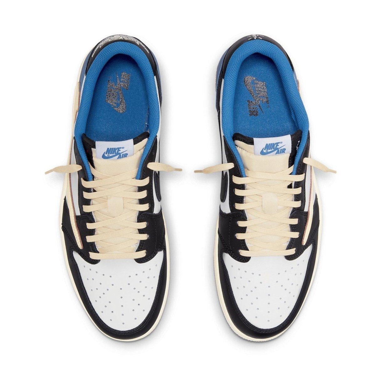 Nike Air Jordan 1 Low Fragment Design x Travis Scott, featuring white leather and black, royal blue accents.