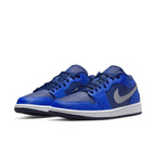Jordan 1 Low Game Royal Blue Void women’s sneakers with gray Swoosh, vibrant blue design, and classic silhouette.