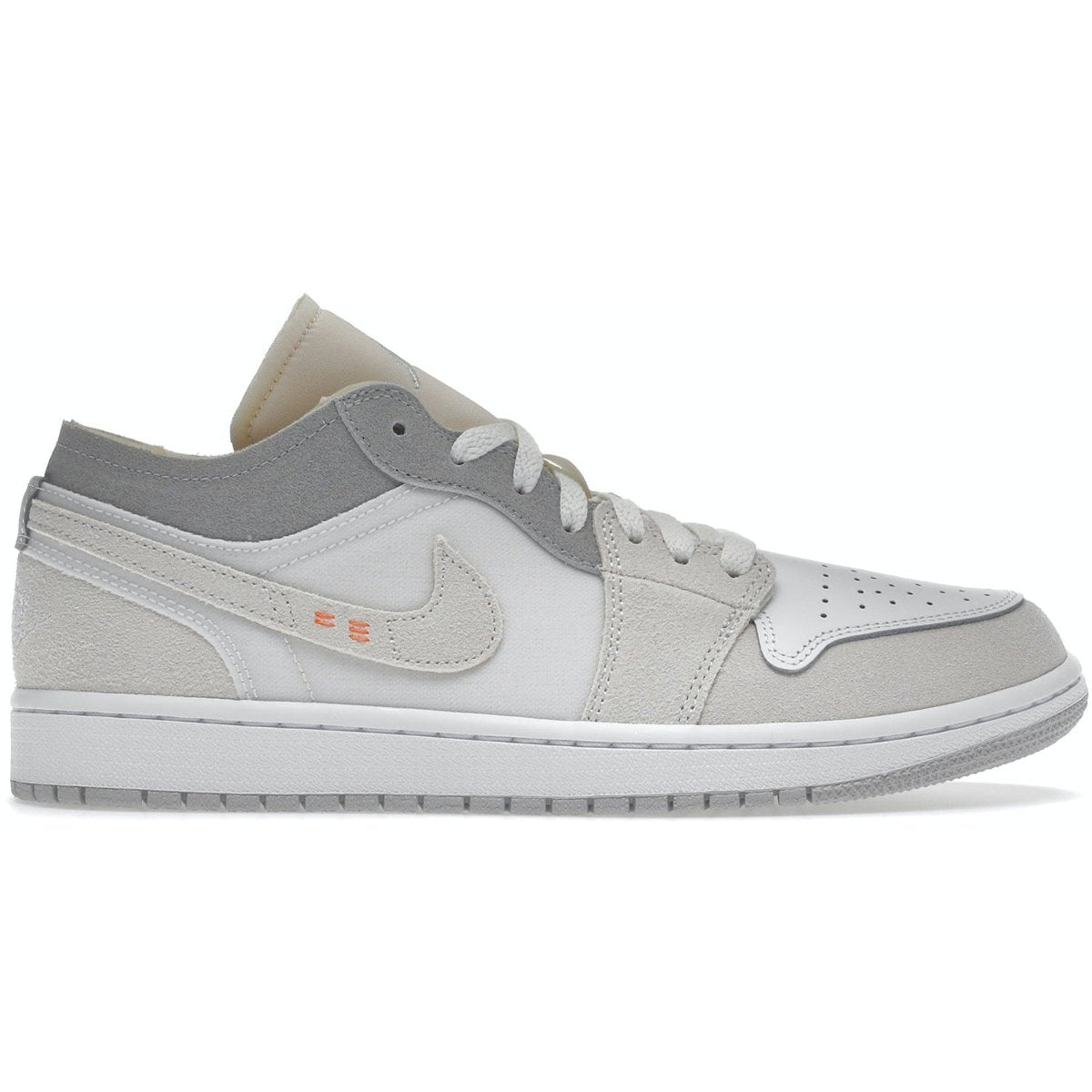 Jordan 1 Low Inside Out White Phantom sneaker featuring a sleek two-tone design and premium materials.