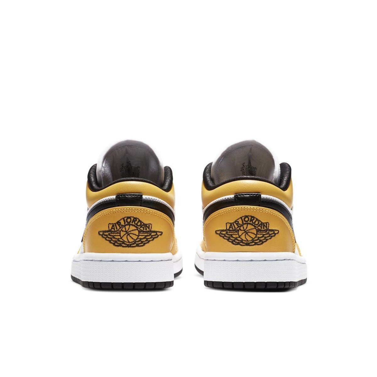 Rear view of women's Air Jordan 1 Low 'Laser Orange' sneakers showcasing yellow and black colorway.