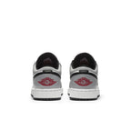 Rear view of Air Jordan 1 Low Light Smoke Grey GS sneakers showcasing premium materials and classic design elements.