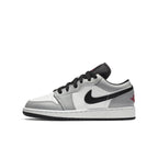 Jordan 1 Low Light Smoke Grey GS sneakers featuring premium materials and a stylish design.