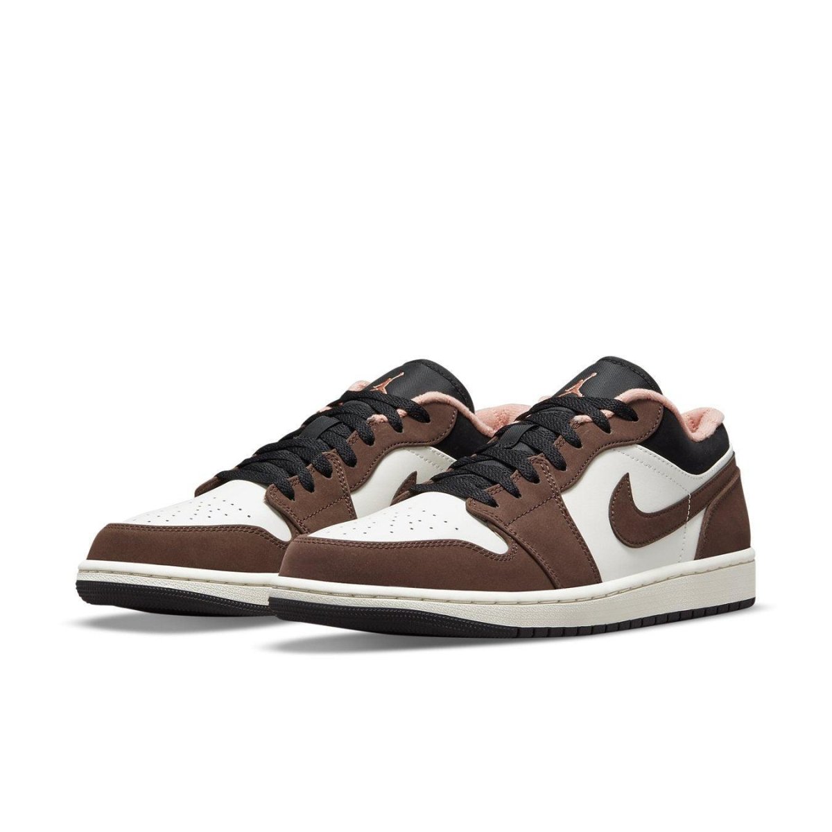 Jordan 1 Low Mocha sneakers in brown suede and white leather, featuring black accents and pink details.