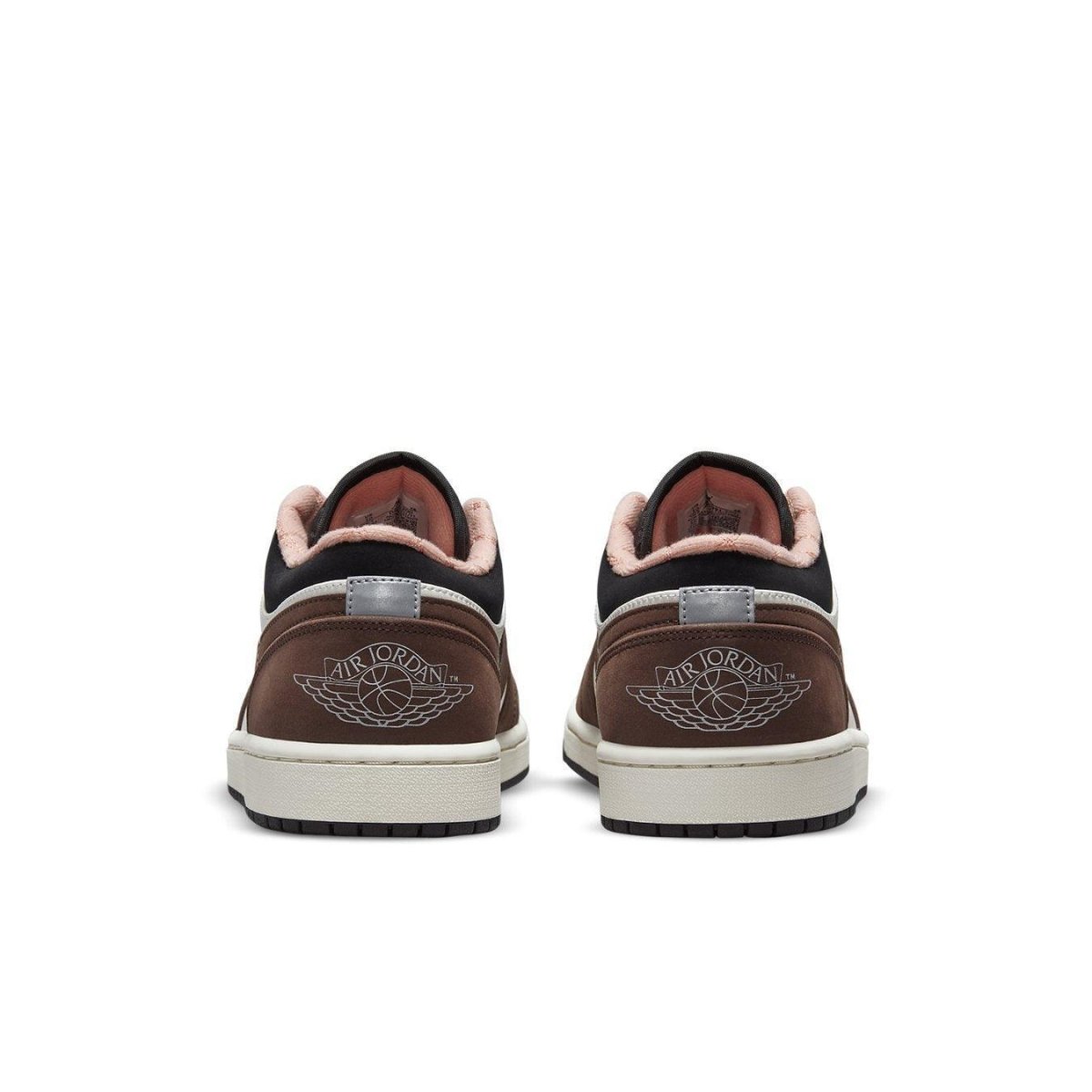 Rear view of Air Jordan 1 Low Mocha featuring brown suede, white leather, and pink lining details.