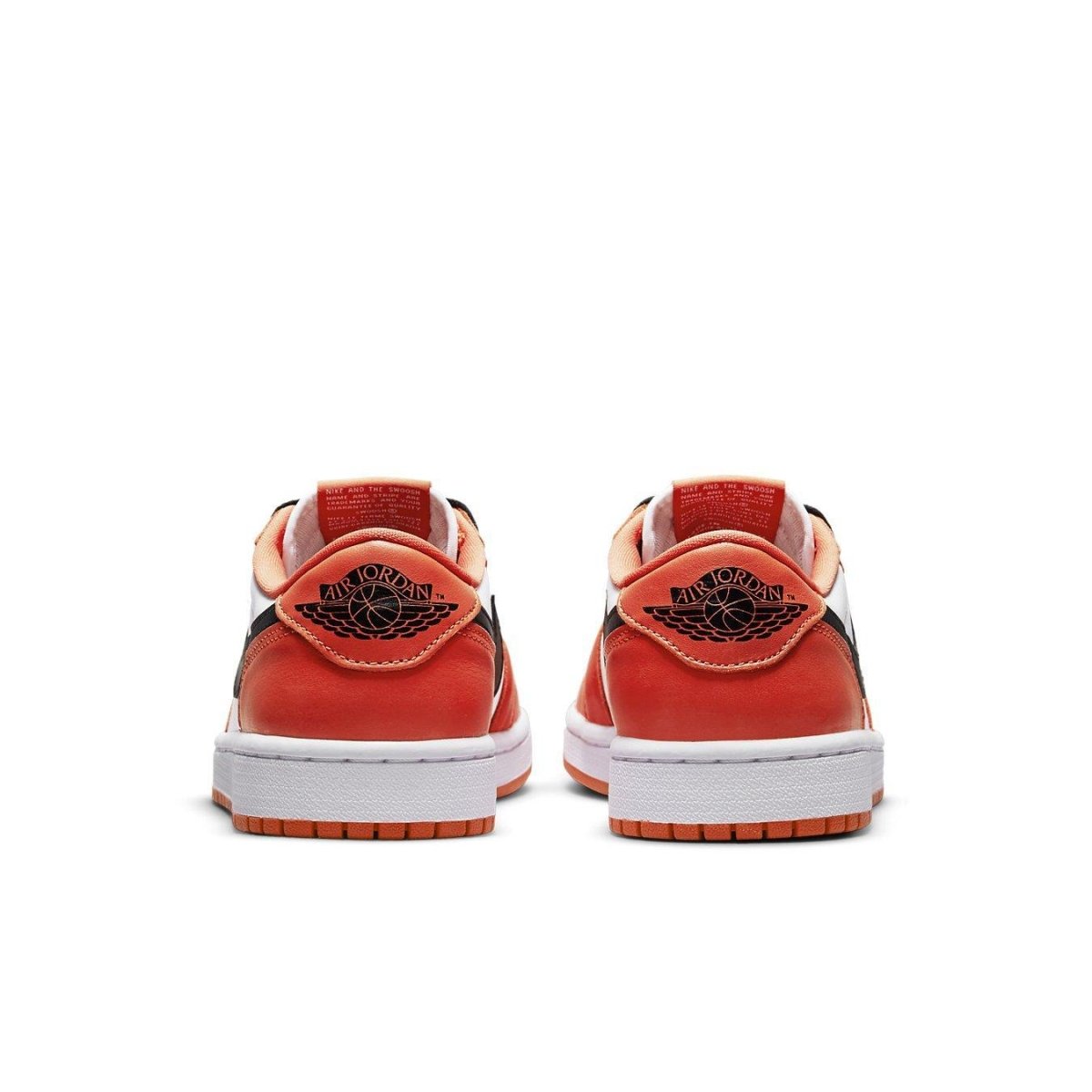 Back view of Air Jordan 1 Low OG Starfish sneakers featuring orange and black design with Jordan Wings logo.