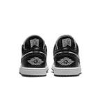 Retro Air Jordan 1 Low Panda Women's sneakers, showcasing the sleek black and white leather design from the back.
