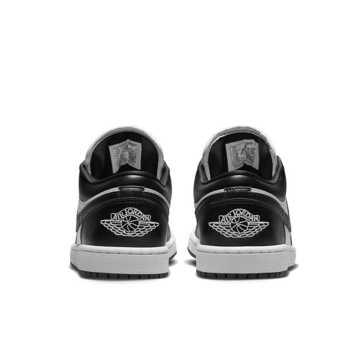 Retro Air Jordan 1 Low Panda Women's sneakers, showcasing the sleek black and white leather design from the back.