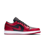 Air Jordan 1 Low Reverse Bred sneaker featuring black and red leather design with Nike Swoosh and perforated toe box.