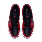 Top view of Air Jordan 1 Low Reverse Bred featuring black and red leather upper with perforated toe box and iconic Swoosh.
