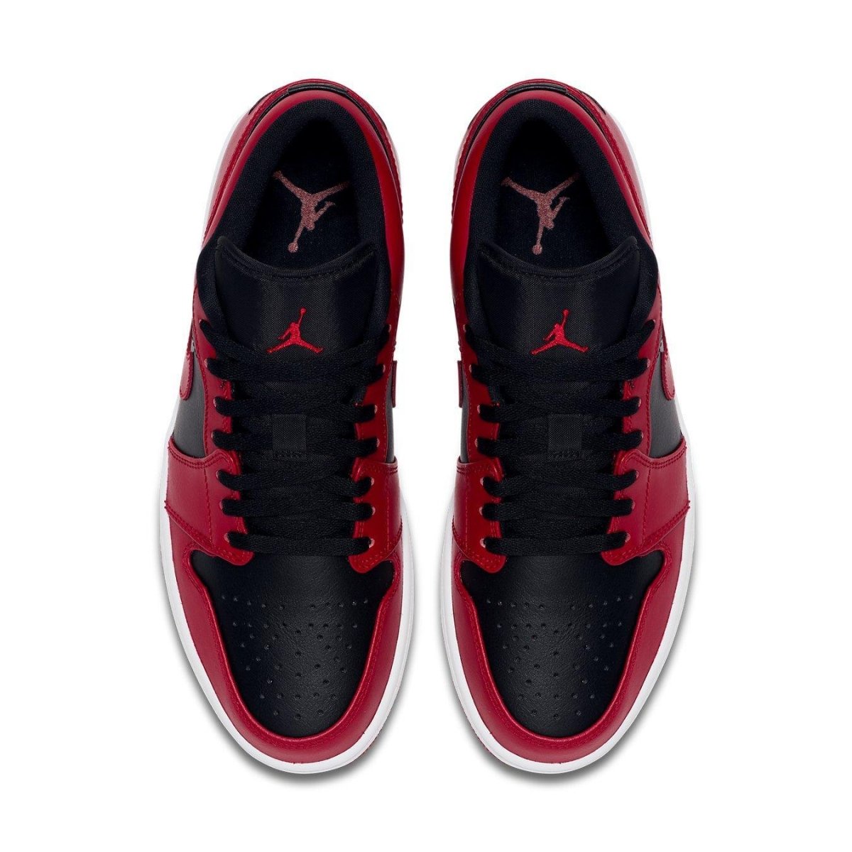 Top view of Air Jordan 1 Low Reverse Bred featuring black and red leather upper with perforated toe box and iconic Swoosh.