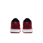 Retro Air Jordan 1 Low Reverse Bred GS sneaker in red and black, featuring iconic logo on the heel.