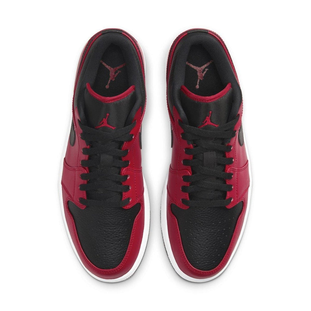 Jordan 1 Low Reverse Bred Pebbled Swoosh in red and black colorway inspired by Chicago Bulls.