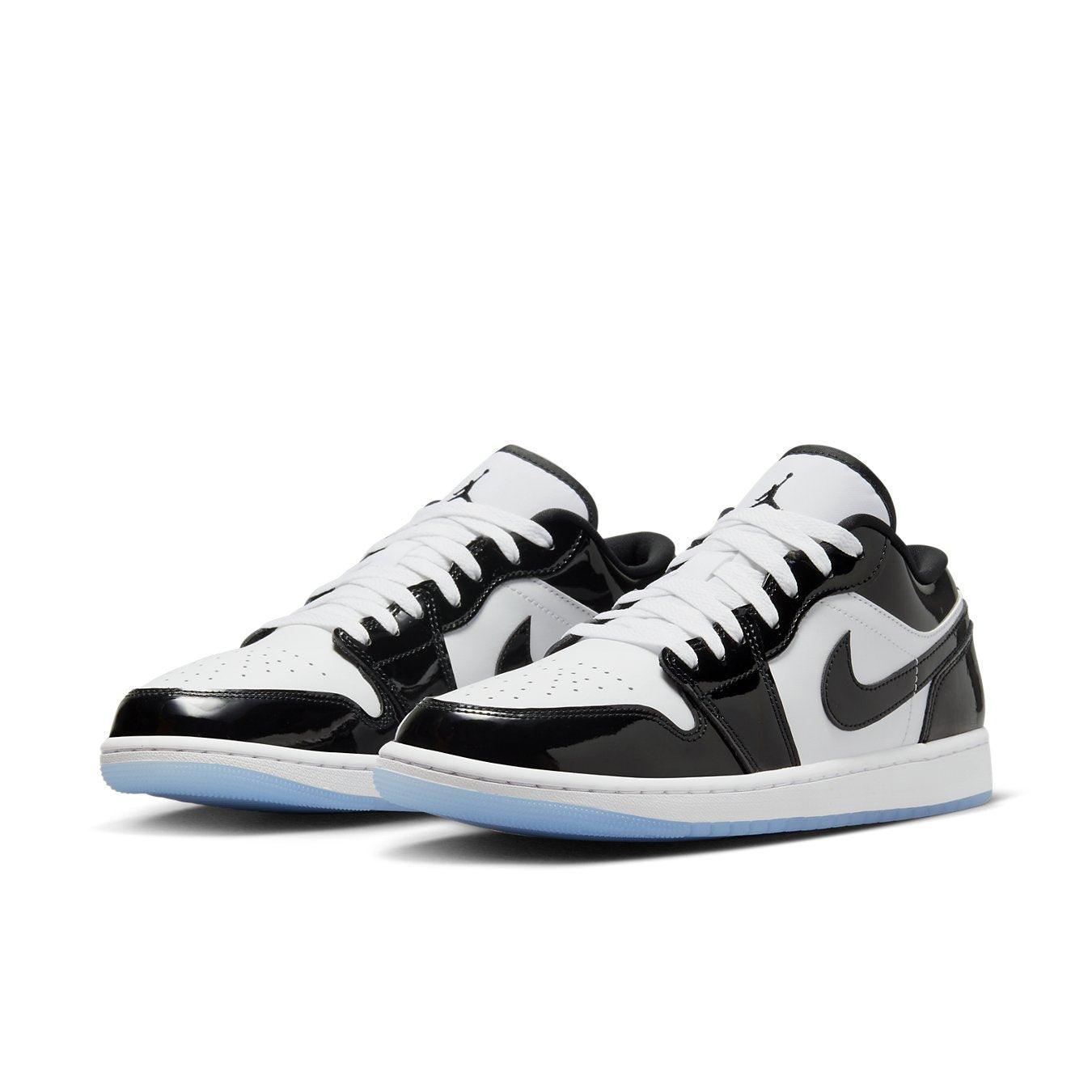 Nike Air Jordan 1 Low SE Concord white leather sneakers with black patent accents and icy outsole.