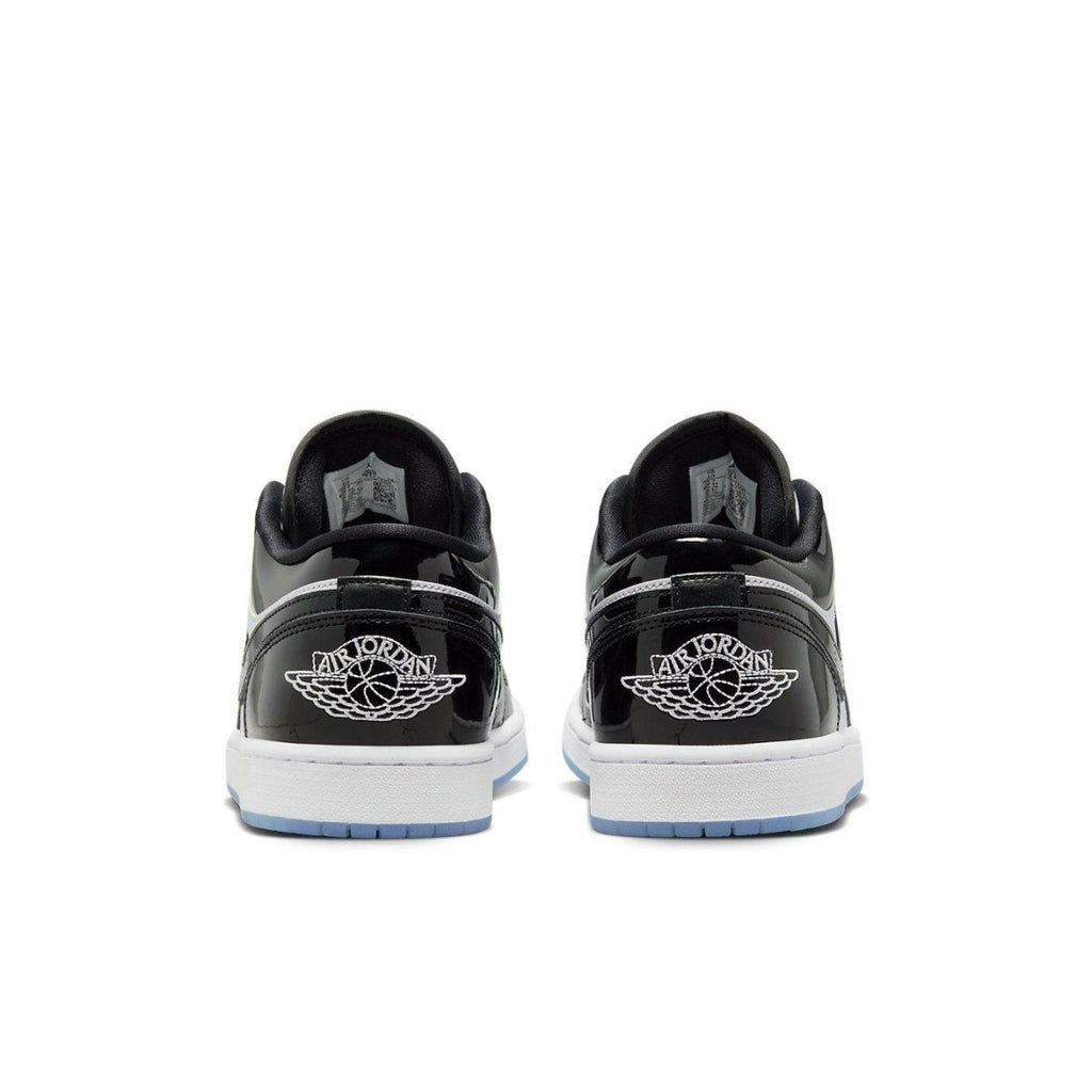 Rear view of Nike Air Jordan 1 Low SE Concord showcasing black patent leather with White Wings logo.