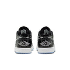 Rear view of Nike Air Jordan 1 Low SE Concord showcasing black patent leather with White Wings logo.