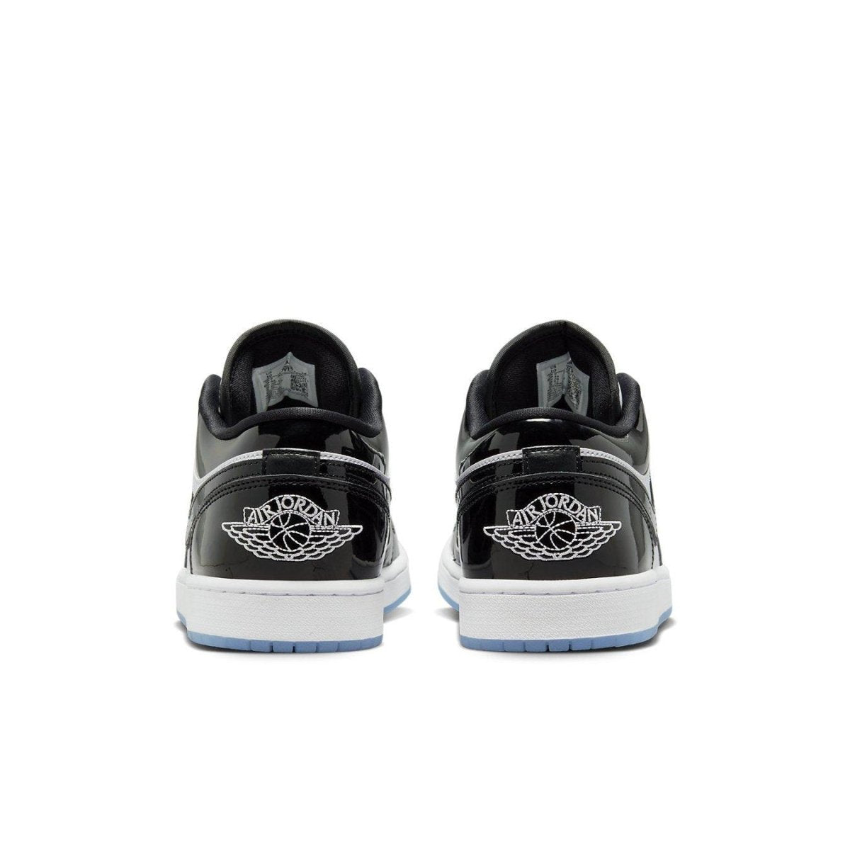 Rear view of Nike Air Jordan 1 Low SE Concord showcasing black patent leather with White Wings logo.