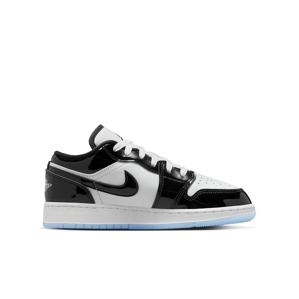 Jordan 1 Low SE Concord GS sneaker featuring black patent overlays and smooth white leather.