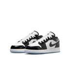 Jordan 1 Low SE Concord GS sneakers in black and white leather with glossy patent detailing.
