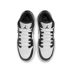 Top view of Air Jordan 1 Low SE Concord GS sneakers in white and black with perforated toe and sleek design.