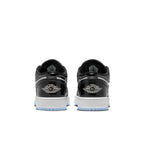 Retro Air Jordan 1 Low SE Concord GS shoes featuring sleek black patent overlays and classic logo detail on the heel.