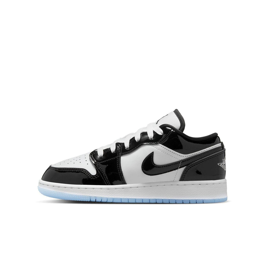 Jordan 1 Low SE Concord GS sneakers in black and white with glossy overlays and ice blue sole.