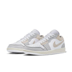 Jordan 1 Low SE Craft Inside Out Tech Grey sneakers featuring layered panels in soft colors.