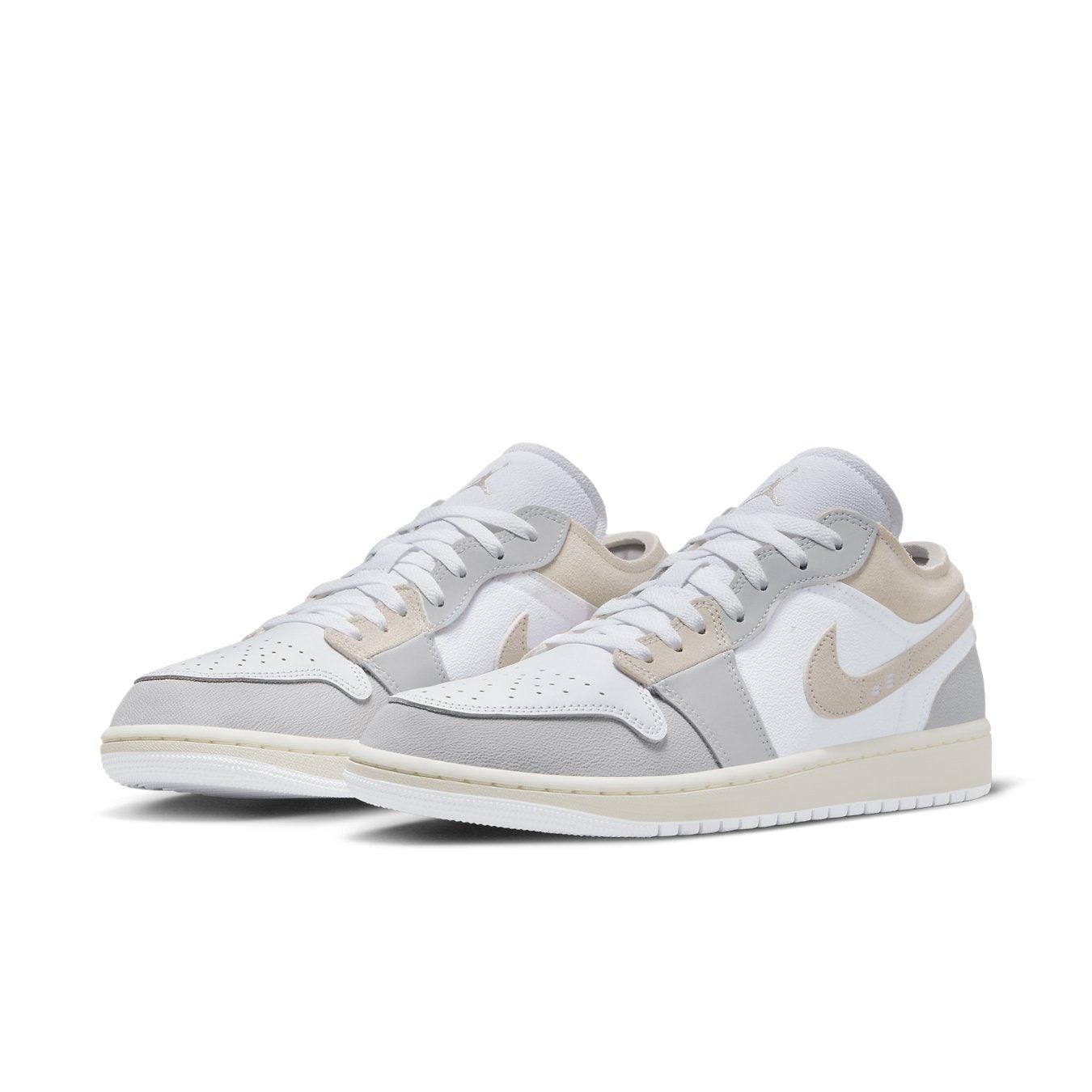Jordan 1 Low SE Craft Inside Out Tech Grey sneakers featuring layered panels in soft colors.