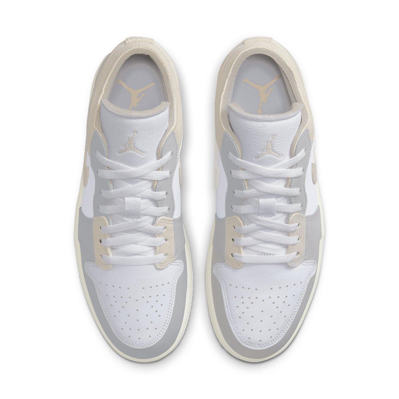 Jordan 1 Low SE Craft Inside Out Tech Grey shoes with a premium layered design and soft neutral colors.