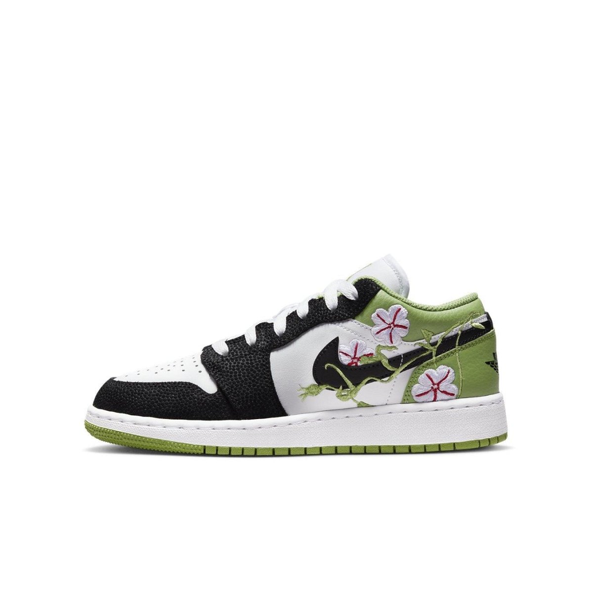 Jordan 1 Low SE Floral Vines sneaker featuring white leather, black overlays, and floral designs on the Swoosh.
