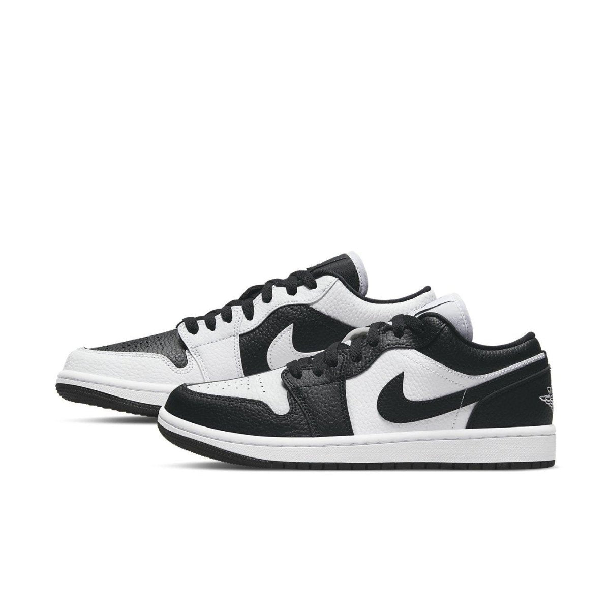 Jordan 1 Low SE Homage Split White Black (W) women's sneakers, featuring a unique half black, half white colorway.