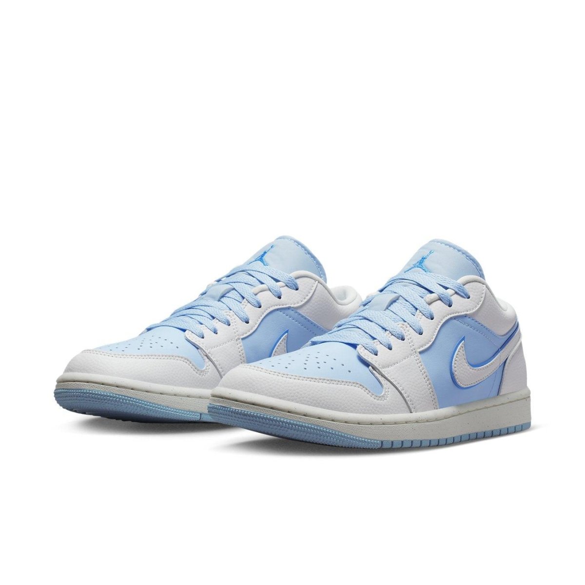 Jordan 1 Low SE Reverse Ice Blue (W) with white and light blue textured upper, showcasing basketball style.