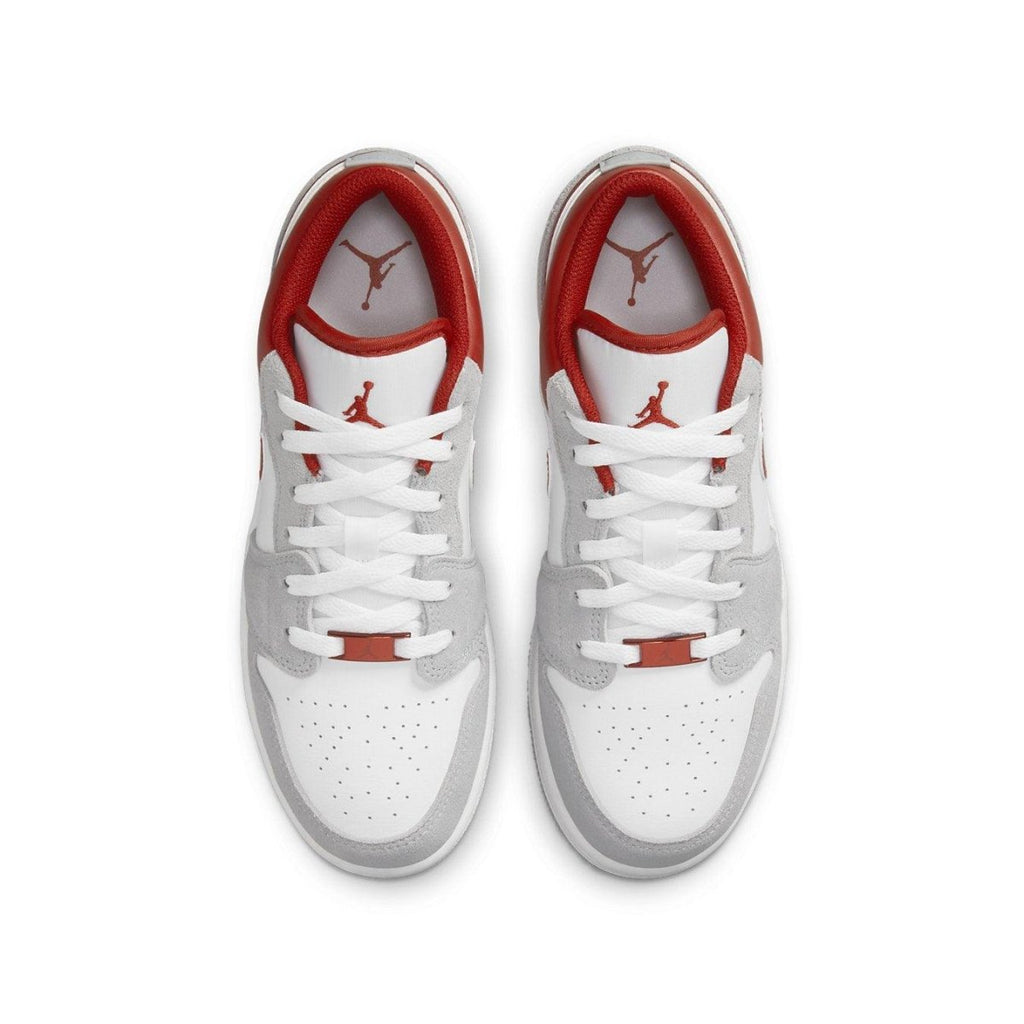 Top view of Air Jordan 1 Low SE Smoke Grey Gym Red sneakers featuring white leather and grey suede accents.