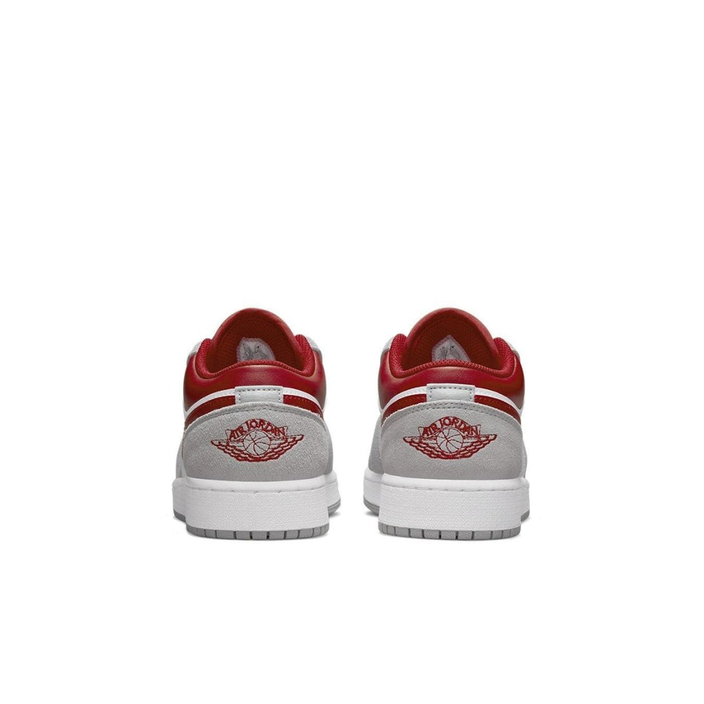 Back view of Air Jordan 1 Low SE Light Smoke Grey Gym Red, showcasing red accents and classic logo.