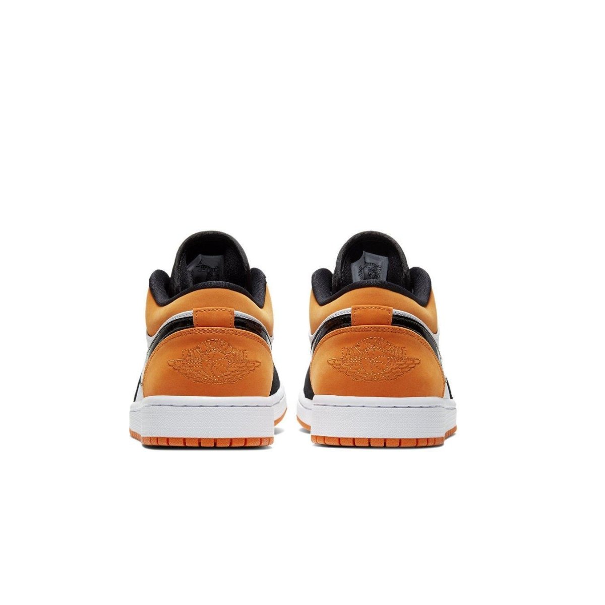 Back view of Jordan 1 Low Shattered Backboard sneakers with orange, black, and white colorway.