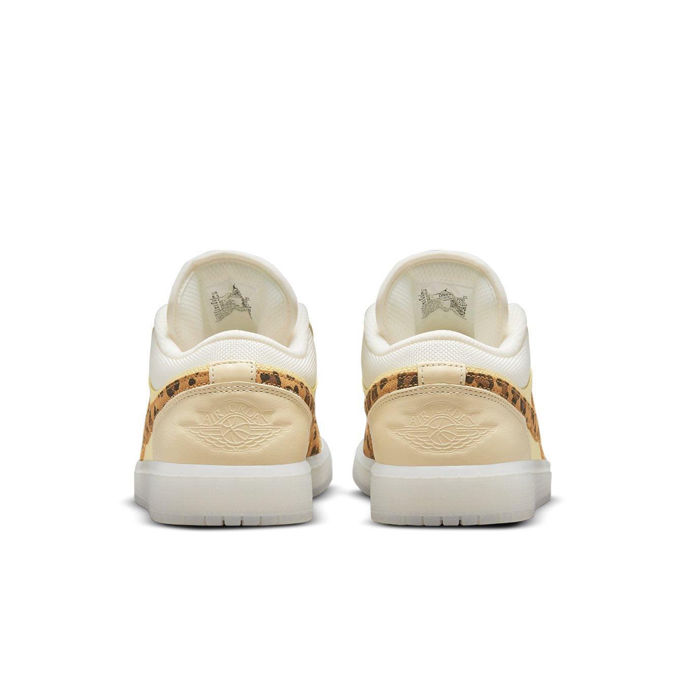 Back view of Air Jordan 1 Low SNKRS Day sneakers featuring leather and leopard print details.