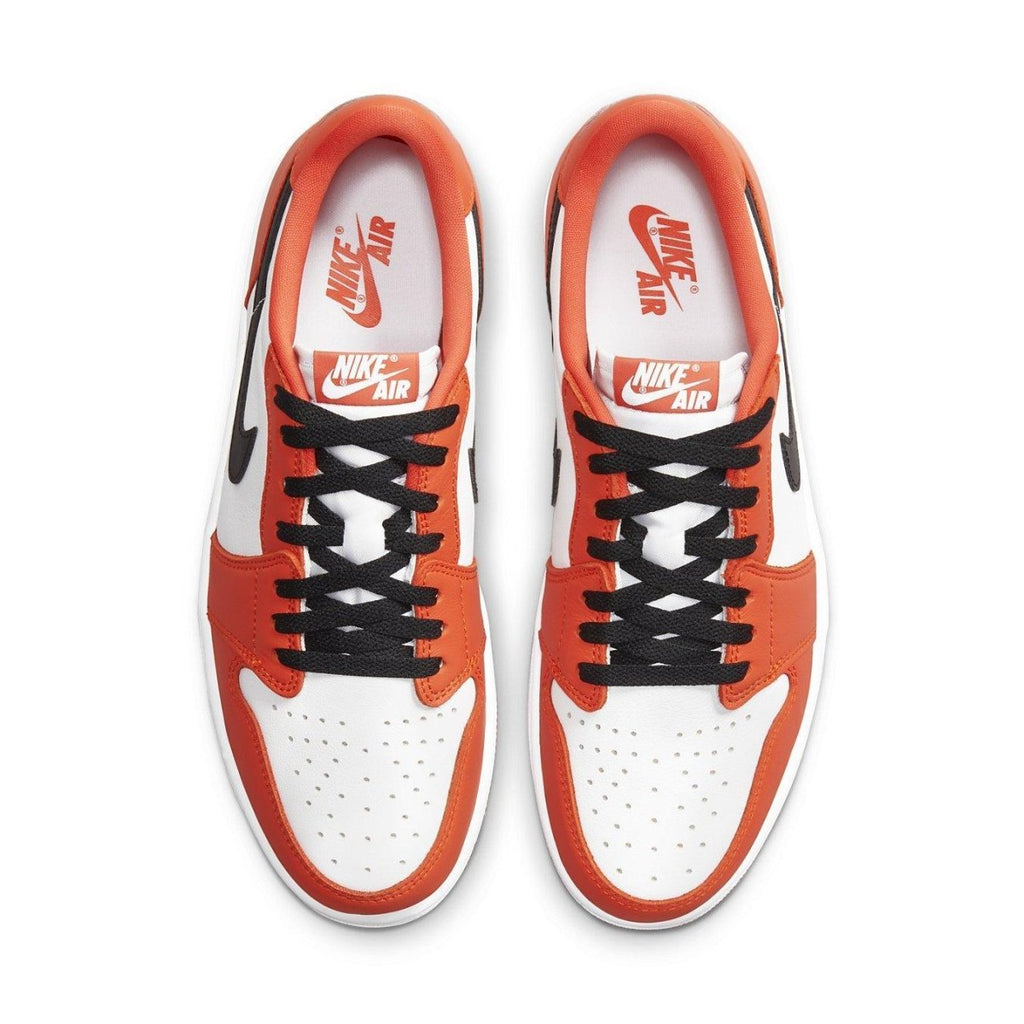 Air Jordan 1 Low OG Starfish featuring white, orange, and black colorway with iconic Nike branding.