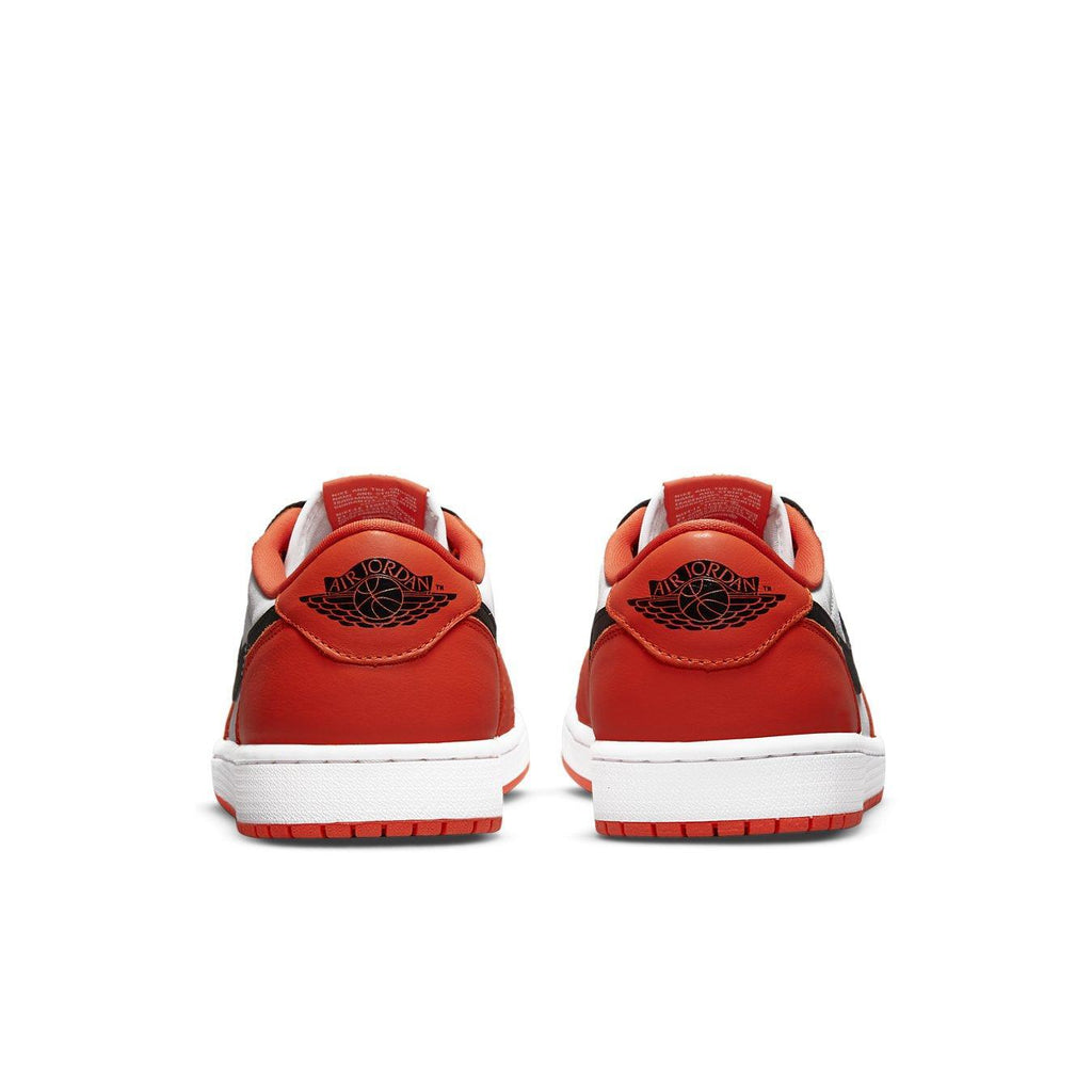 Rear view of Air Jordan 1 Low Starfish showcasing orange and black colorway with Jordan Wings logo.