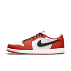 L'Air Jordan 1 Low OG Starfish sneaker in white, orange, and black colorway on a white background.