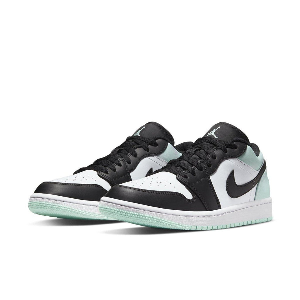 Air Jordan 1 Low Tie-Dye sneakers featuring a black, white, and tie-dye mint design.
