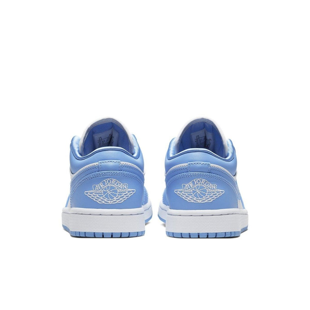 Back view of Air Jordan 1 Low UNC women's sneakers featuring University Blue leather and iconic Jordan Wings logo.