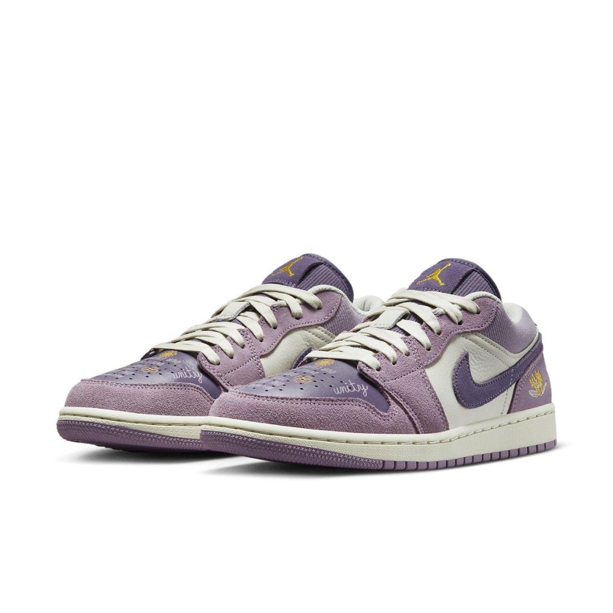 Air Jordan 1 Low Unity (W) in purple and white, featuring suede and leather materials to celebrate unity.