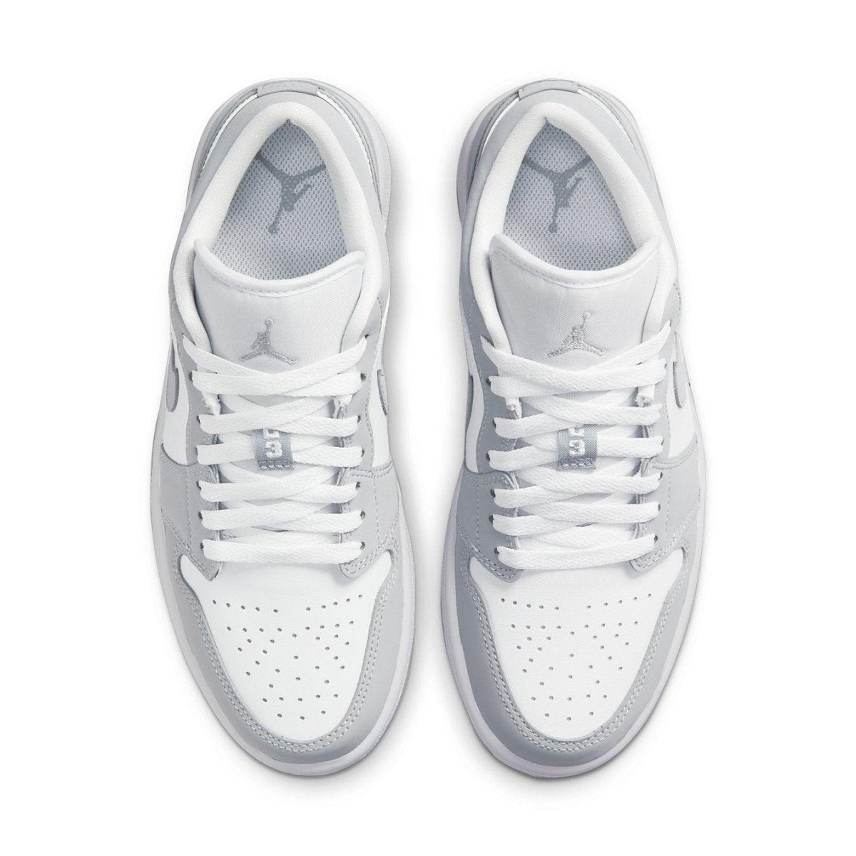Top view of Jordan 1 Low Wolf Grey women's sneaker featuring premium white and wolf grey leather.